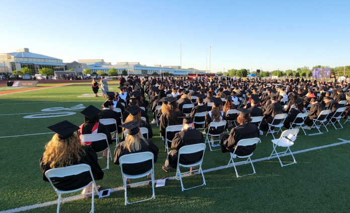 A view of the 2022 commencement at Warsaw Community School's Fisher Field. News Now Warsaw file photo.